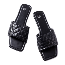 Tongs élégantes noires avec matelassage de Labrie le noir