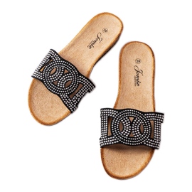 Toboggans noirs décorés de jets Lagacé