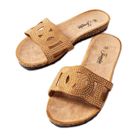 Toboggans beiges ornés de jets Lagacé