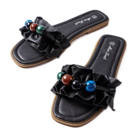 Claquettes noires à volants Fortier