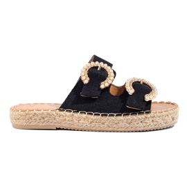 Claquettes femme noires à boucle Shelovet