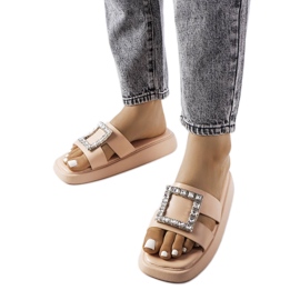 Claquettes beiges avec strass de Fusberta