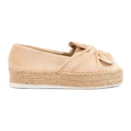 Espadrilles en daim sur la plateforme avec un noeud Shelovet beige