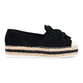 Espadrilles en daim noir sur la plateforme avec un nœud de Shelovet