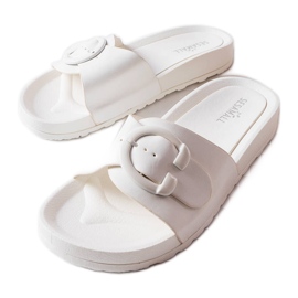 Inna Claquettes blanches à boucle de chez Généreux