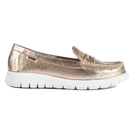 Mocassins dorés sur une épaisse plate-forme Shelovet d'or Mocassins dorés sur une épaisse plate-forme Shelovet d'or