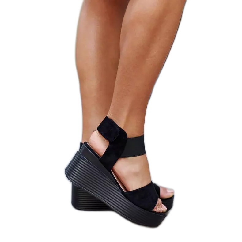 Sandales compensées noires de Romani le noir Sandales compensées noires de Romani le noir