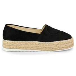 Espadrilles noires sur la plateforme
