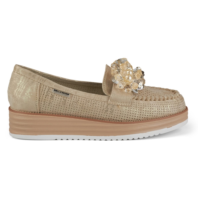 Chaussures ajourées sur la plate-forme avec une décoration beige