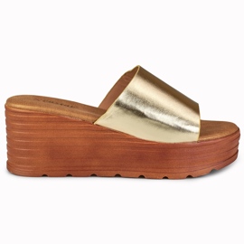 Claquettes compensées dorées Versis