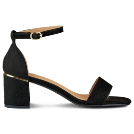 Sandales noires à petit talon avec un détail doré le noir
