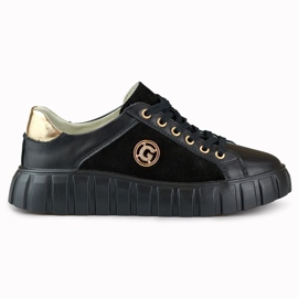 Chaussures de sport en cuir noir avec détails dorés