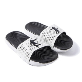 Chaussons en caoutchouc noir et blanc d'Athènes blanche