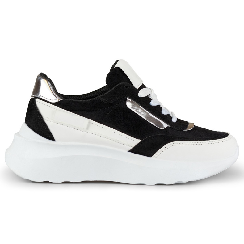 Chaussures de sport noires à semelle blanche le noir