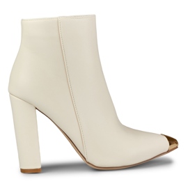 Bottes beiges pour dames avec une pointe décorative