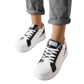 Inna Chaussures noires et blanches avec un accent argenté de Palais