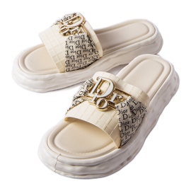 Claquettes décoratives en caoutchouc beige de Bérard