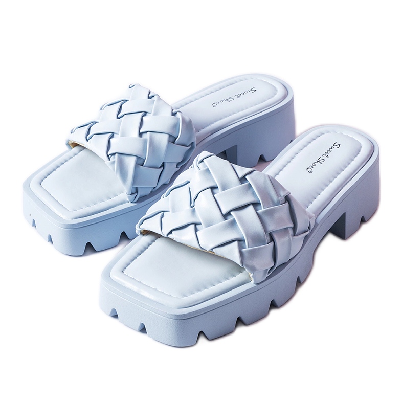 Tongs bleues à semelle tracteur Lora Tongs bleues à semelle tracteur Lora