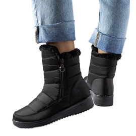 Bottes de neige noires avec une cale basse Mount