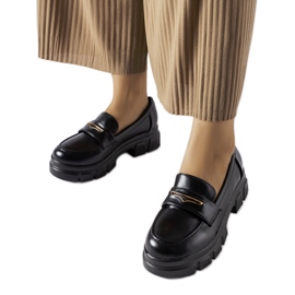Mocassins Fuori noirs avec bande de roulement apparente