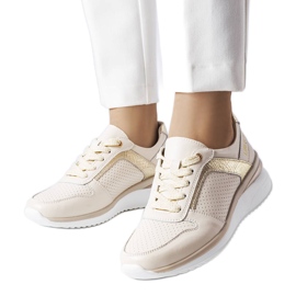 Chaussures en cuir ajouré beige Trás