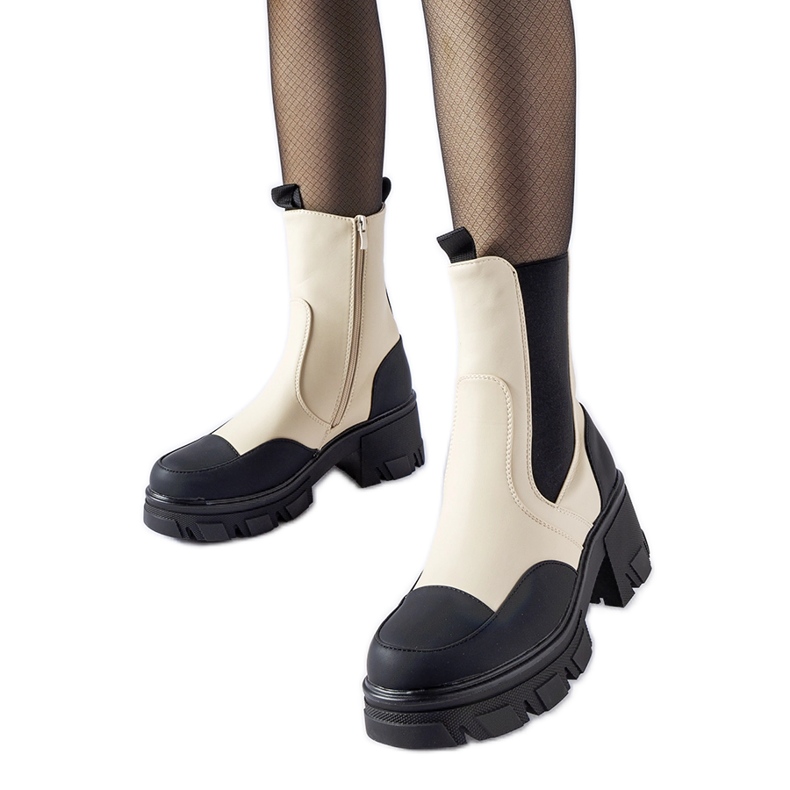 Bottines à enfiler massives beiges et noires de Mafalda