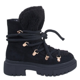 Bottes de neige en peau de mouton noir Shea