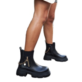 Bottines noires avec chaîne Archard décorative