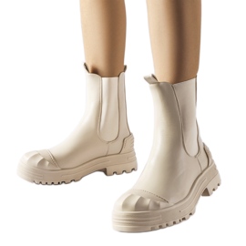 Bottines massives isolées beiges par Albanese Bottines massives isolées beiges par Albanese