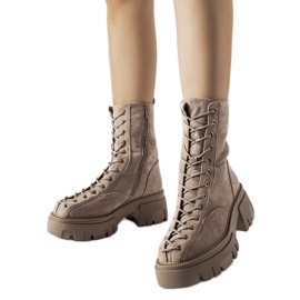 Bottines marron ornées d'un liseré Amol brun