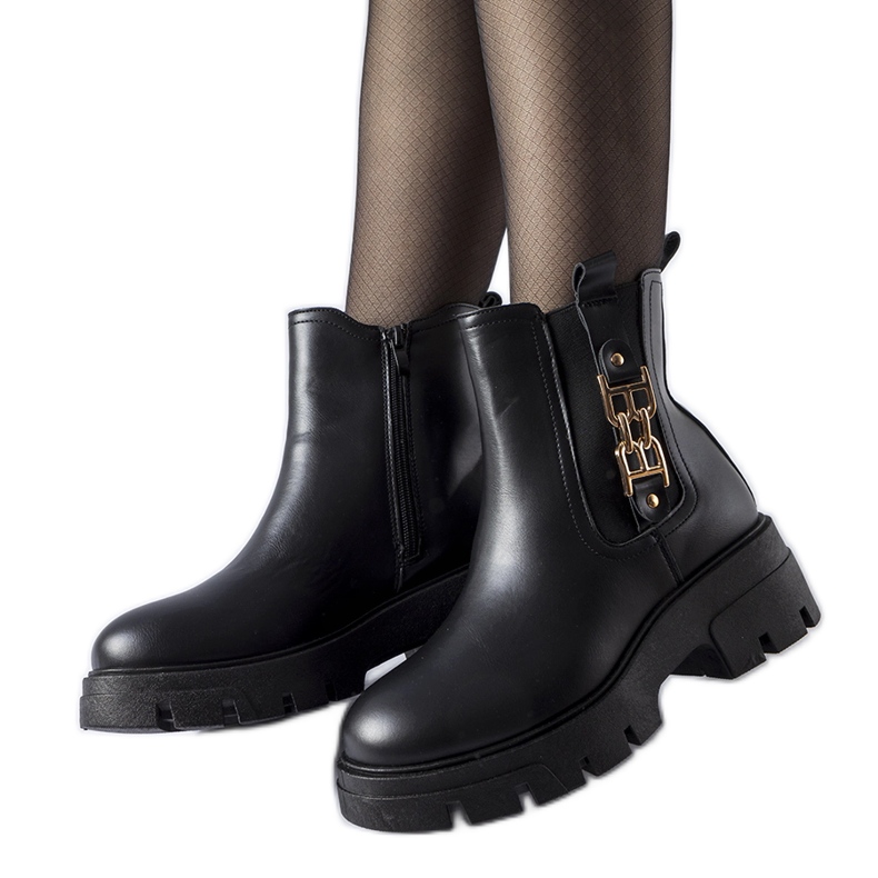 Bottines massives noires avec boucle décorative Nuovo le noir