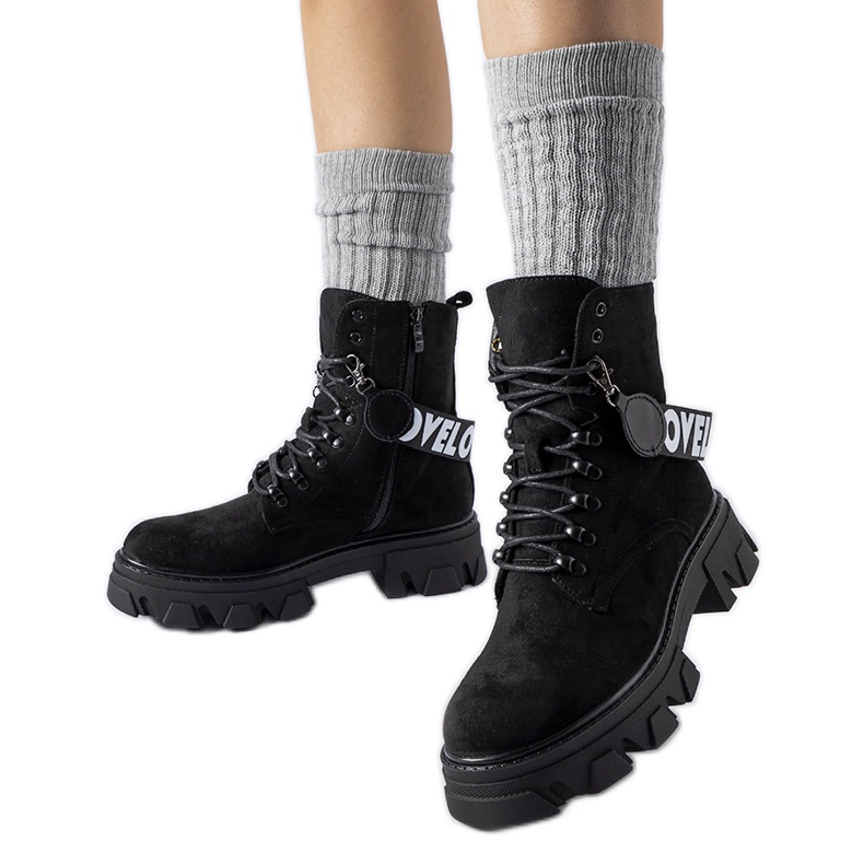 Bottines noires à bride décorative amovible le noir