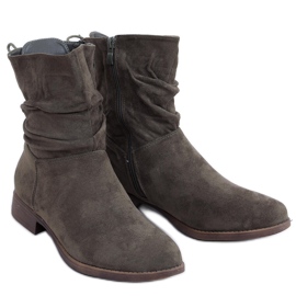 Bottines plates en daim vert Theda