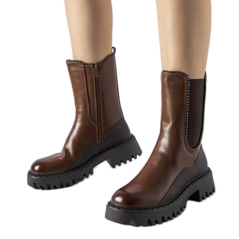 Bottes isolées marron par Donigala brun