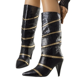 Bottes isolées Nevzo noires et dorées le noir