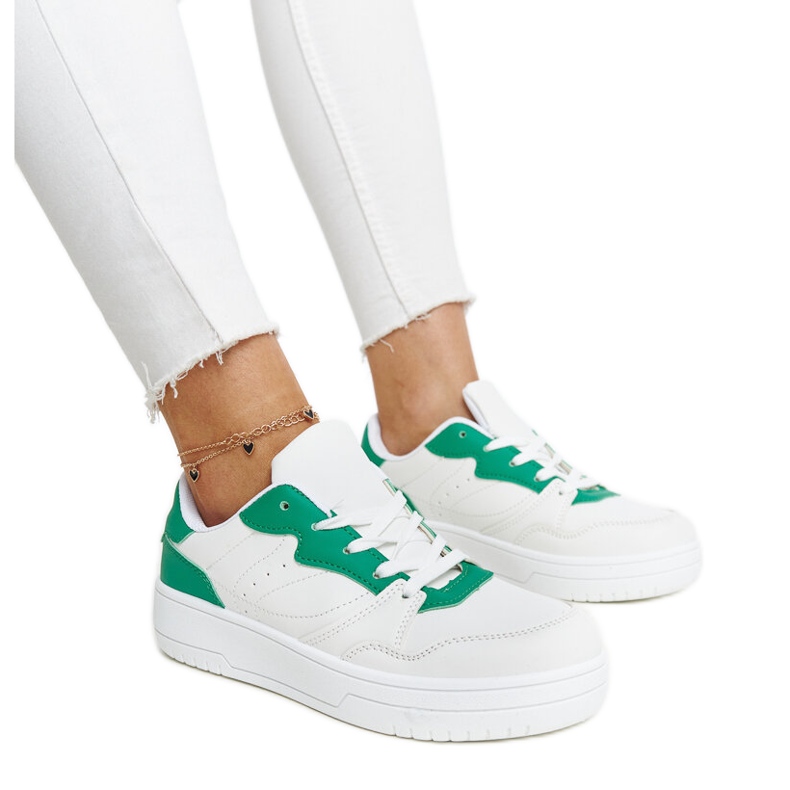 Baskets blanches avec un accent Fournie vert
