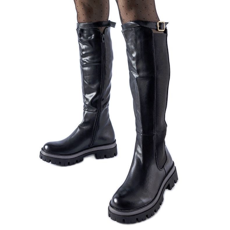 Bottes massives noires avec ceinture Stuart décorative le noir
