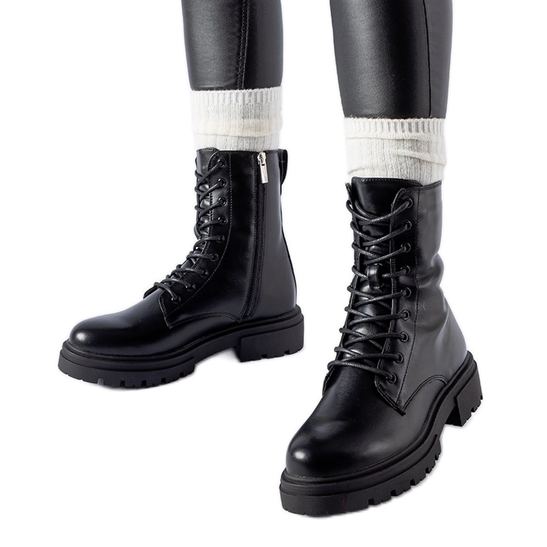 Bottes Heights isolées noires le noir