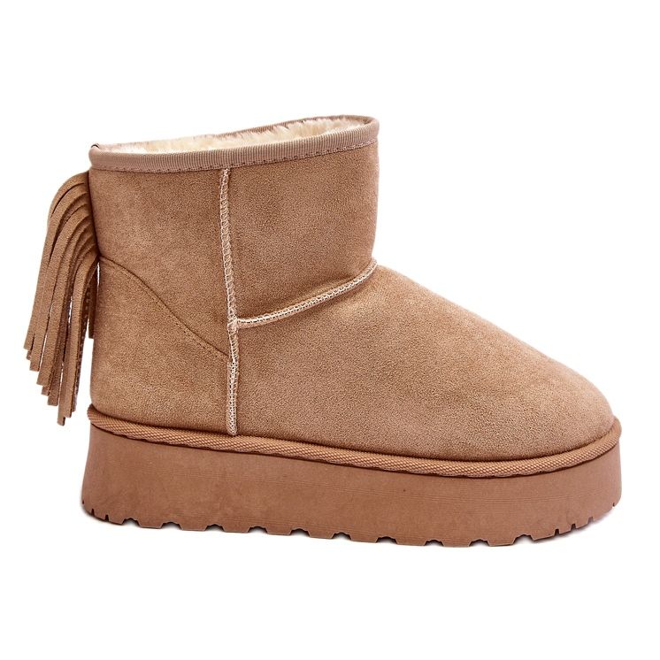 Bottes de neige pour femmes sur une plate-forme massive avec des beige frangés