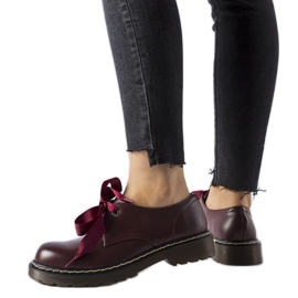 Chaussures marron avec un nœud décoratif de Rodriguez rouge