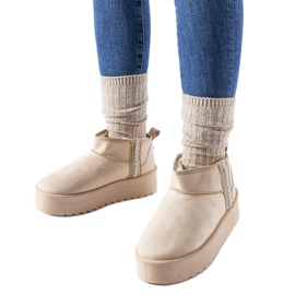 Bottes de neige beiges sur la plateforme Dennison