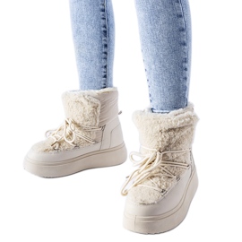 Bottes de neige beiges sur une plateforme Elvio massive