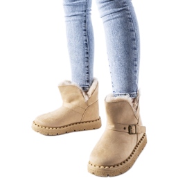 Bottes de neige isolées beiges à découpe de Monal