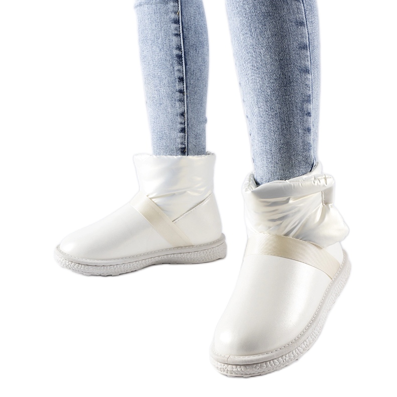 Bottes de neige courtes brillantes beiges de Delaune