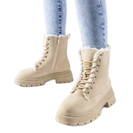 Bottes isolées beiges de Tadasuni