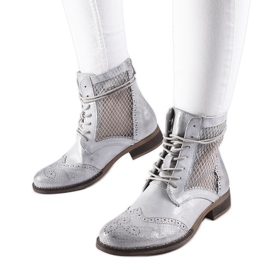 Bottines plates ajourées argentées par Reeves