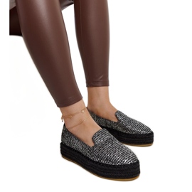 Espadrilles noires ornées de fils argentés de chez Havin le noir