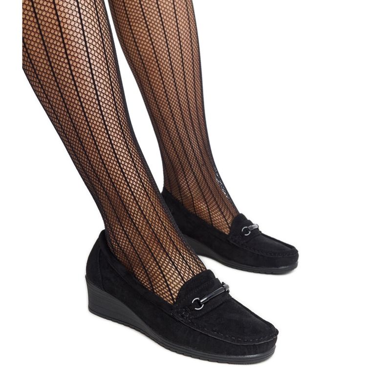 Les mocassins compensés noirs d'Amel le noir
