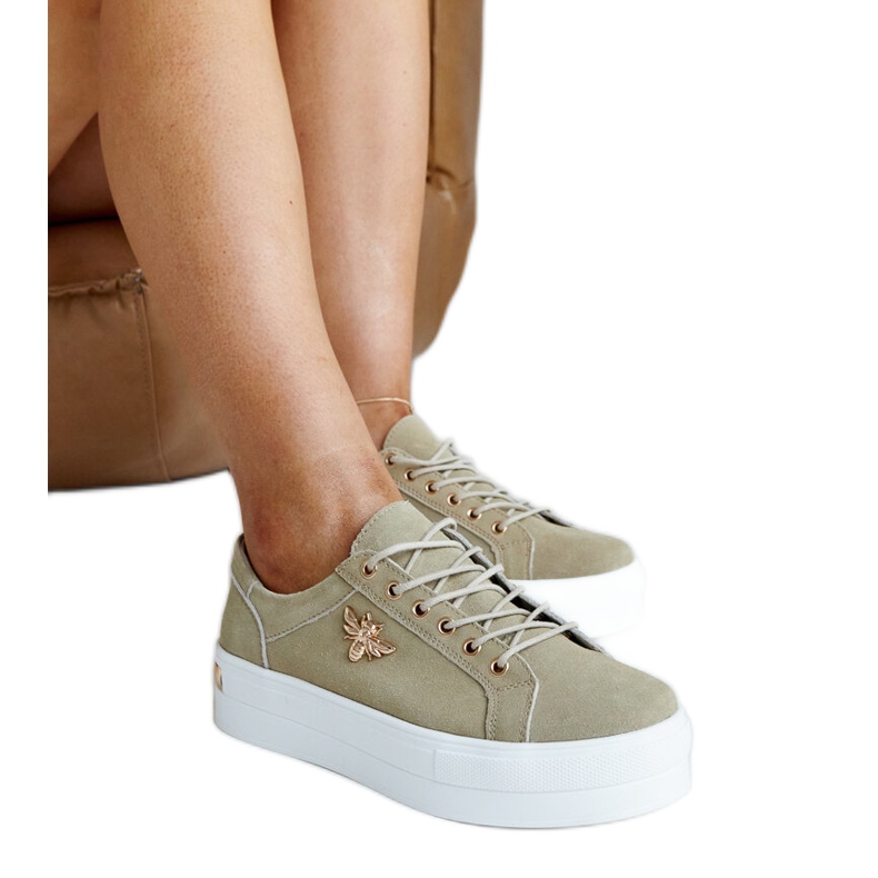 Chaussures de sport en cuir vert avec décoration
