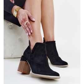 Boots asymétriques isolées noires avec bloc Vanja le noir